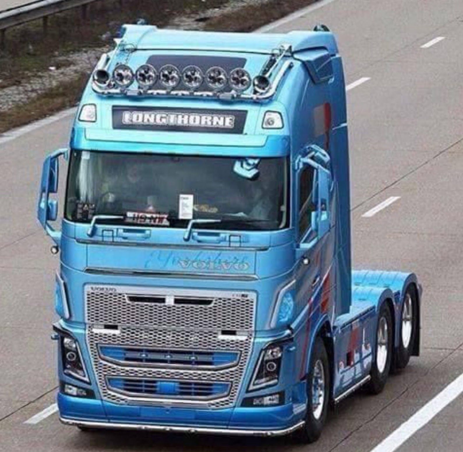 Вольво фн. Вольво ФН 16. Грузовик Вольво FH 750. Тягач Вольво ФН 16. Volvo fh16 Blue.